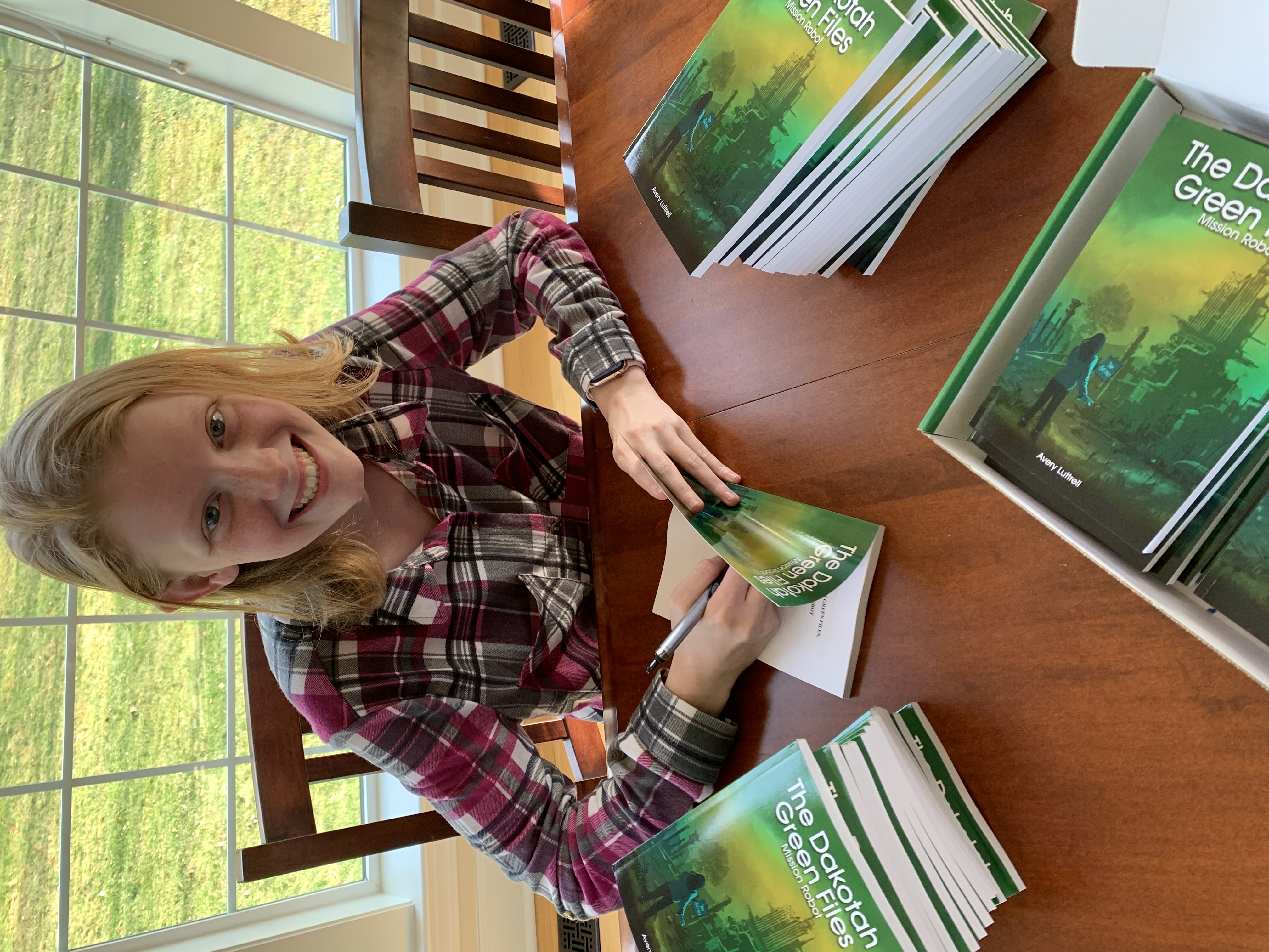 Read more about the article Local firm takes on youngest client ever: 14-year-old local book author